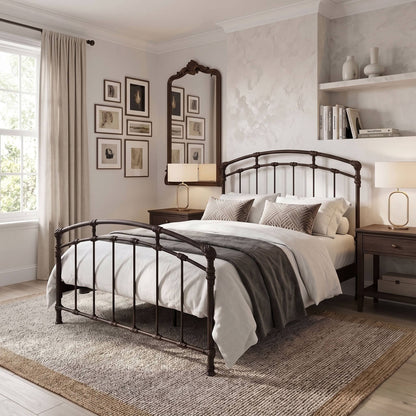 Test Iron Bed by Wesley Allen in Expresso finish in Queen size platform iron bed frame with wood slats. A dark metal bed frame with an arched headboard and footboard, styled in a classic bedroom setting with white and gray bedding, nightstands, and a large woven rug.