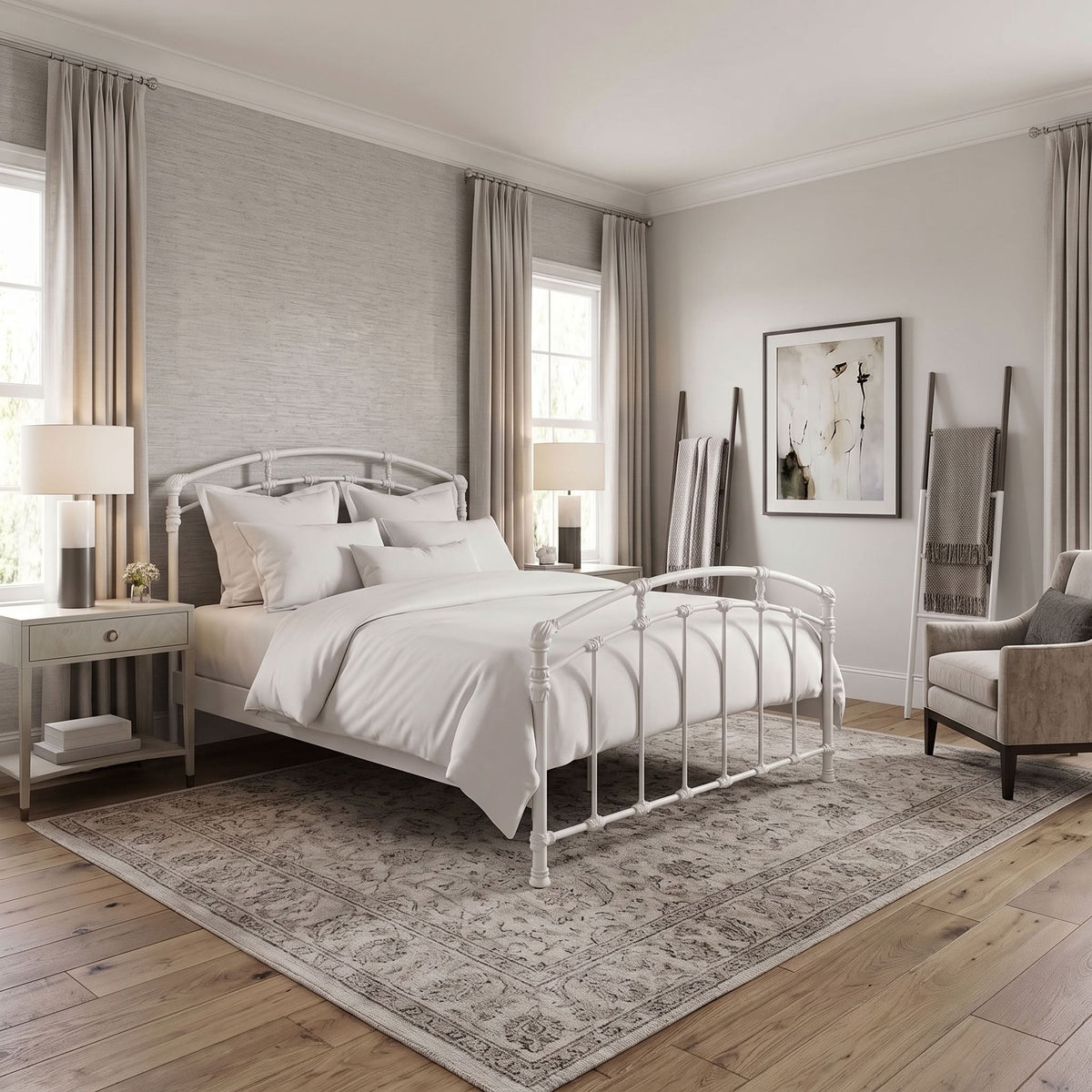 Test Iron Bed by Wesley Allen in Matte White finish in Queen size platform frame with wood slats. A white metal bed frame with a classic turned-post design, styled in a bright, modern bedroom with white bedding, a large patterned area rug, and light gray walls.