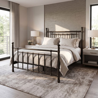 Blake iron bed 1094 in Aged Gold finish, queen size, in a modern bedroom with a textured accent wall and ivory bedding, by Wesley Allen for Matriae.